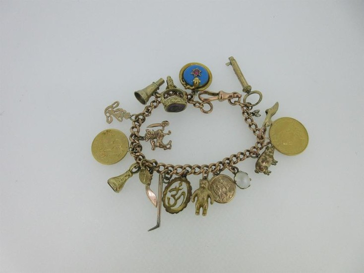 A 9ct gold charm bracelet with eighteen charms