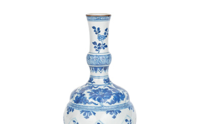 A BLUE AND WHITE PETAL-MOULDED VASE Early Kangxi