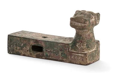 A BRONZE CHARIOT ORNAMENT China, Western Zhou dynasty The object...