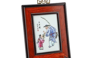 A CHINESE FAMILLE ROSE PLAQUE