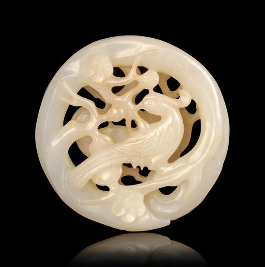A Carved White Jade Pendant Diam. 2 1/4 in., 5.7 cm.