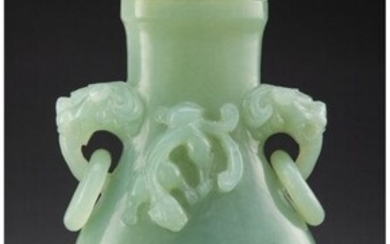 A Chinese Carved Celadon Hardstone Covered Vase