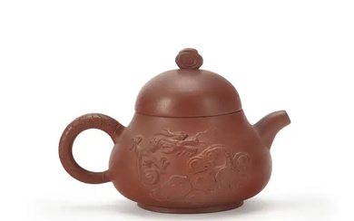 A Chinese Yixing 'dragon' teapot 20th century The teapot of compressed pear...