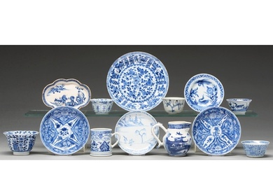 A Chinese blue and white tea bowl and pair of saucers, Kangx...
