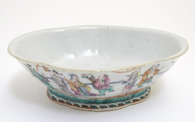 A Chinese bowl of elongated quatrefoil form decorated