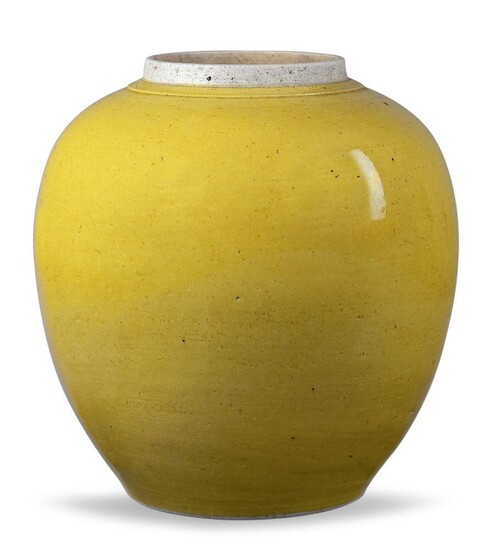 A Chinese porcelain monochrome yellow-glazed jar, Jiaqing period, of ovoid form, covered in an egg-yolk yellow glaze, the rim unglazed, 21.5cm high Provenance: Private North London collection
