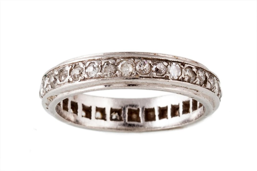 A DIAMOND ETERNITY RING, with old cut diamonds of approx. 1....