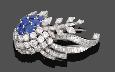 A Diamond and Sapphire Brooch, circa 1950, of stylised floral...