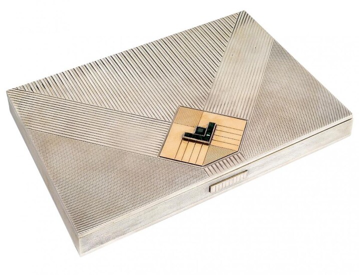 A French silver Art Deco vanity case, of rectangular form, the striated lid set with green paste detail on an applied gilt plaque, the case with five compartments to interior, one containing a lighter, another with comb, maker's mark indistinct, c...