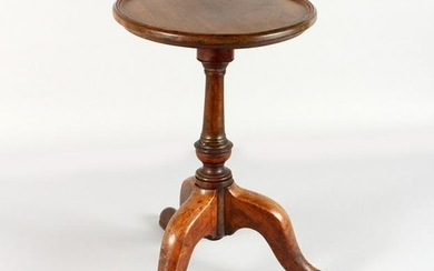 A GEORGIAN MAHOGANY KETTLE STAND, with circular top.