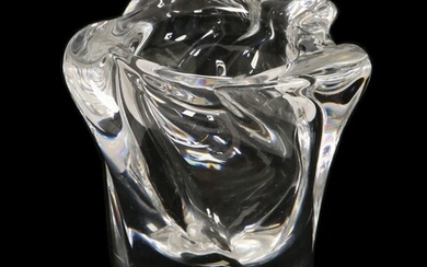 A GLASS VASE IN THE FORM OF A FLOWER