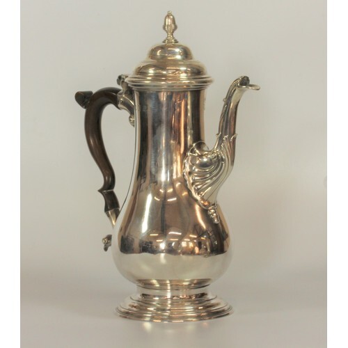 A George III Sterling Silver Coffee Pot. William Cripps. Lon...