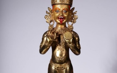 A Gilt Bronze Figure of Standing Buddha