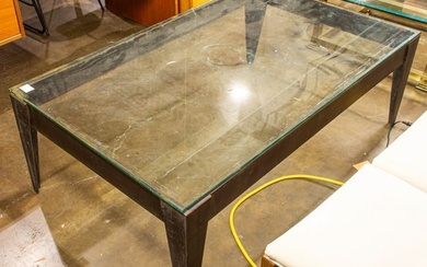 A Jack A. Chandler glass top coffee table with wrought iron base