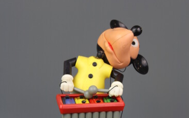A Kohner bros. Inc children's puppet of Mickey Mouse playing a xylophone, H. 21cm, together with two small nodding headed Mickey figures.