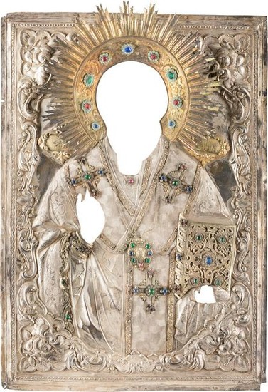 A LARGE SILVER OKLAD FROM AN ICON SHOWING ST. NICHOLAS