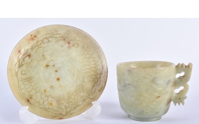 A LATE 19TH CENTURY CHINESE CARVED GREEN STONE CUP AND SAUCE...