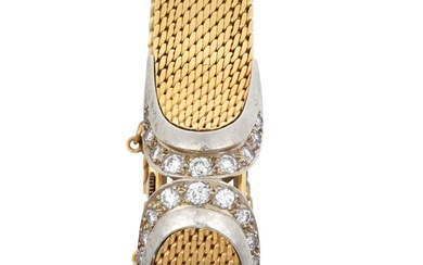 A Lady's 14 Carat Gold Diamond Set Concealed Dial Wristwatch,...