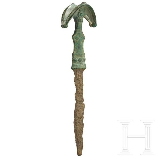 A Luristan iron sword with exceptional bronze hilt, 9th