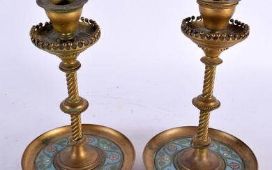 A PAIR OF 19TH CENTURY FRENCH BRONZE AND CHAMPLEVE ENAMEL CANDLESTICKS with spiral formed central st