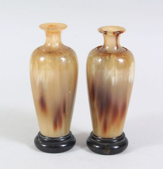 A PAIR OF CHINESE HORN MINIATURE VASES ON STANDS