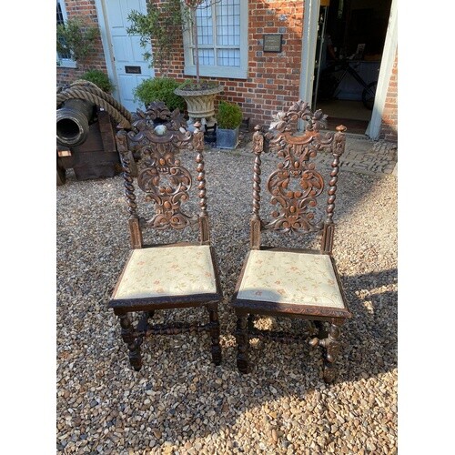 A PAIR OF LATE VICTORIAN OAK CAROLEAN STYLE STANDARD CHAIRS ...