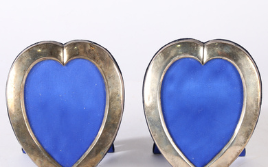 A PAIR OF LATE VICTORIAN SILVER HEART SHAPED PHOTO FRAMES, LONDON 1898 (2).