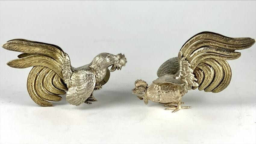 A PAIR OF PERUVIAN STERLING SILVER FIGHTING COCKS
