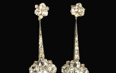 A Pair of 9 Carat White and Yellow Gold, Diamond Drop Earrings; the hanging flower-heads each set wi