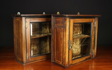 A Pair of Small Late Victorian Rosewood Side Cabinets inlaid with stringing (from a sideboard). The