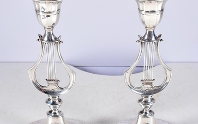 A Pair of Victorian Silver Lyre Candlesticks (with weighted ...