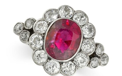 A RUBY AND DIAMOND CLUSTER RING, 1920S Oval ruby