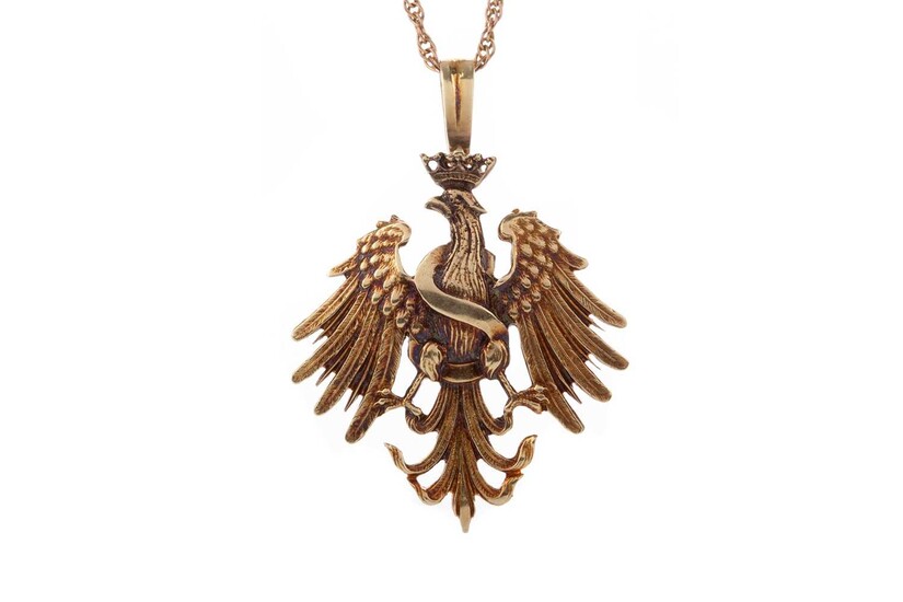 A RUSSIAN FOURTEEN CARAT GOLD EAGLE PENDANT ON CHAIN