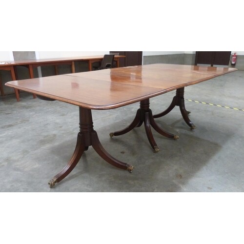 A Regency style mahogany triple pedestal dining table, exten...