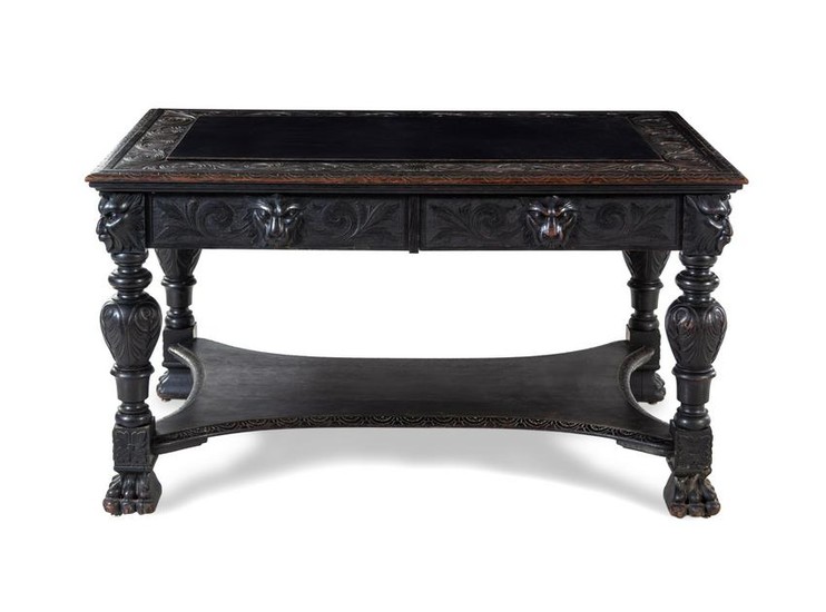 A Renaissance Revival Carved Library Table