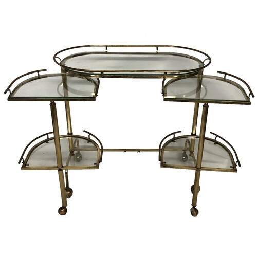 A STYLISH MID 20TH CENTURY BRASS AND GLASS DRINKS TROLLEY T...