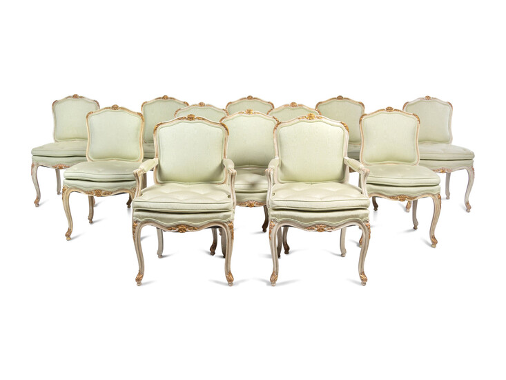 A Set of Twelve Louis XV Style Painted and Parcel Gilt Dining Chairs