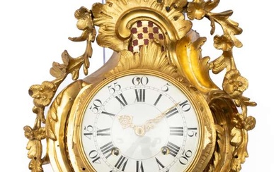 A Swiss ormolu cartel clock