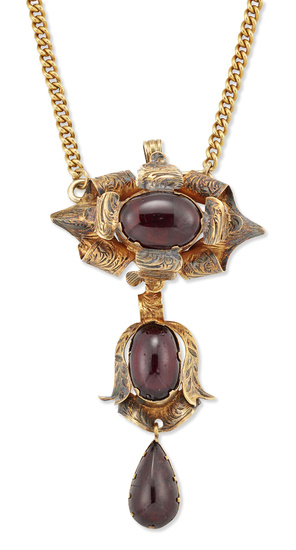 A Victorian garnet pendant, later adapted, two oval cabochon garnets...
