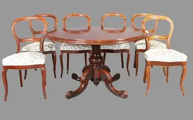 A Victorian mahogany breakfast table and a set of six Victorian mahogany...