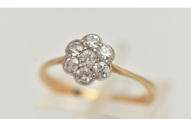 A YELLOW METAL DIAMOND CLUSTER RING, flower shape cluster se...