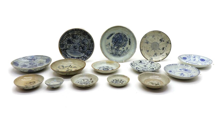 A collection of Chinese blue and white saucers