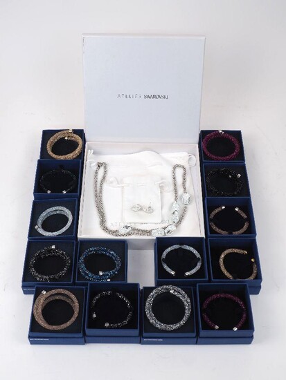 A collection of Swarovski Crystal to include; the Atelier core collection comprising a Moselle Strandage necklace, a pair of Moselle earrings for pierced ears, and a further fourteen bracelets in assorted colours, all with presentation boxes