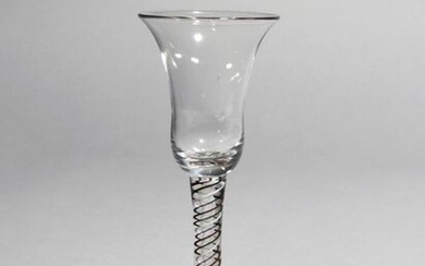 A coloured twist wine glass c.1760, with a...
