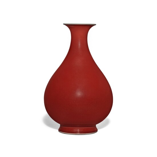 A copper-red-glazed pear-shaped vase (Yuhuchunping), Seal mark and period of Qianlong | 清乾隆 紅釉玉壺春瓶 《大清乾隆年製》款