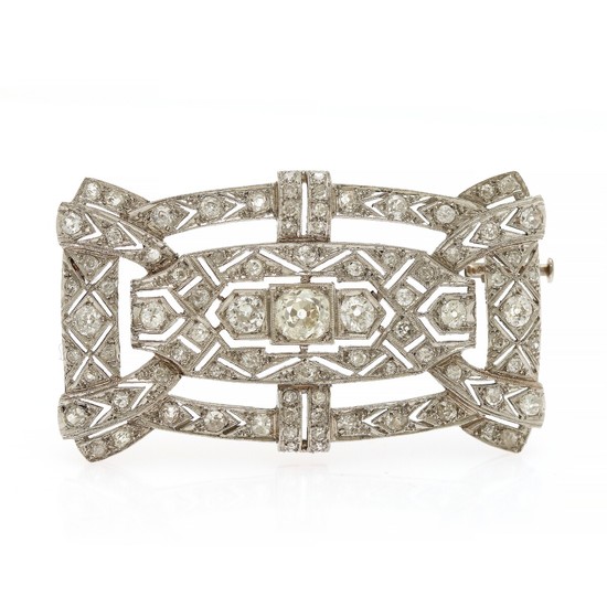 A diamond brooch set with an old-cut diamond encircled by numerous old-, single- and rose-cut diamonds, totalling app. 3.50 ct., mounted in platinum.