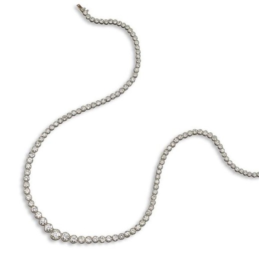 A diamond rivière necklace, millegrain-set with graduated round...
