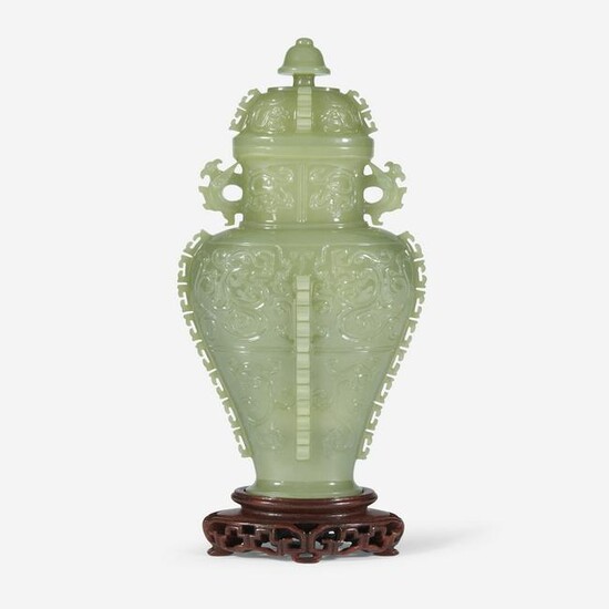 A finely-carved Chinese celadon jade archaistic vase
