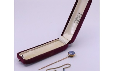 A gem set stick pin in box appro. 3.1 grams