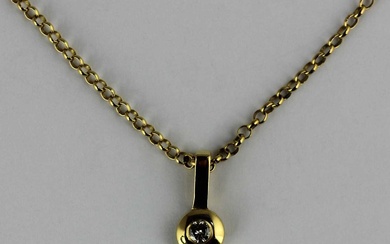A gold and diamond single stone pendant